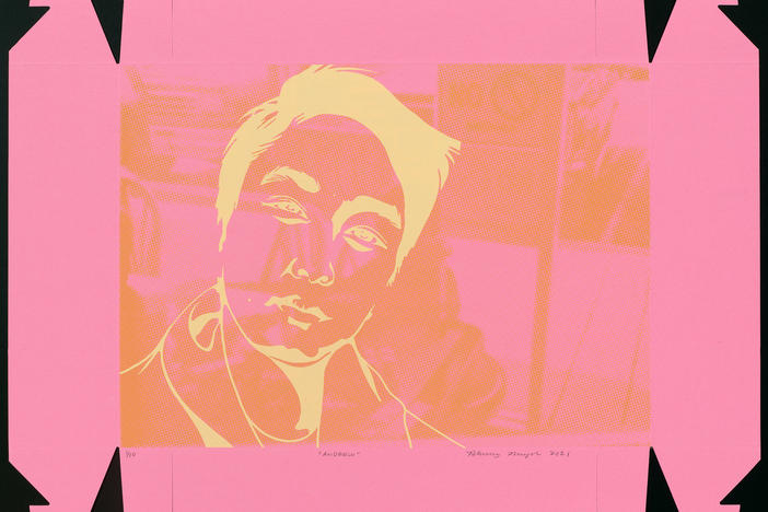 Rapper Andrew Hean, whose family owned a donut shop in California, is pictured in a silkscreen print on a donut box by artist Phung Huynh.