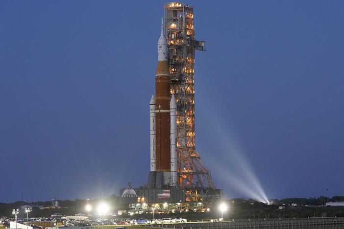 The NASA Artemis 1 rocket with the Orion spacecraft aboard moves slowly on an 11 hour journey to a launch pad at the Kennedy Space Center in Cape Canaveral, Fla., on Thursday, March 17, 2022.