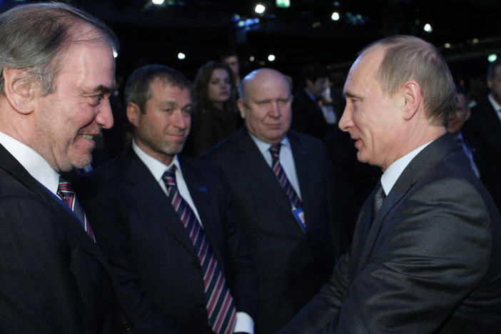 Russian Prime Minister Vladimir Putin in a meeting with Russian oligarch Roman Abramovich (on the left, in the center) in 2010.