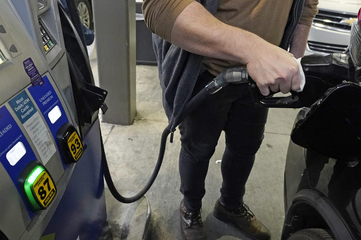 A customer pumps gasoline into his car in Gulfport, Miss., on Feb. 19.
