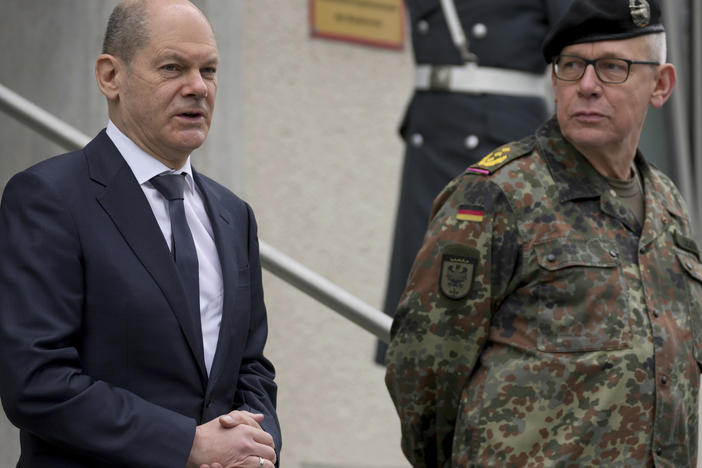 German Chancellor Olaf Scholz speaks as he arrives for a visit of the Joint Operations Command of the German armed forces in Schwielowsee near Berlin, March 4.