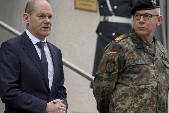 German Chancellor Olaf Scholz speaks as he arrives for a visit of the Joint Operations Command of the German armed forces in Schwielowsee near Berlin, March 4.