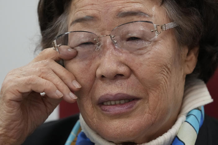 Lee Yong-soo, a South Korean sexual slavery survivor who has been demanding since the early 1990s that the Japanese government fully accept culpability and offer an unequivocal apology, wipes her tear during an interview in Seoul, South Korea, on March 16, 2022.