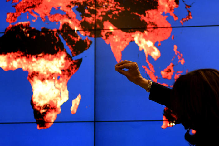 Vice President Harris looks at a hyperwall during a climate change discussion at the  Goddard Space Flight Center in Greenbelt, Md., on Nov. 5 , 2021. The SEC unveiled new proposals on Monday requiring companies to disclose climate-related risks.