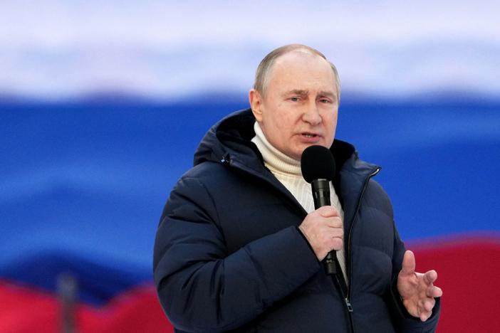 Russian President Vladimir Putin gives a speech at a concert marking the eighth anniversary of Russia's annexation of Crimea at the Luzhniki stadium in Moscow on March 18, 2022.