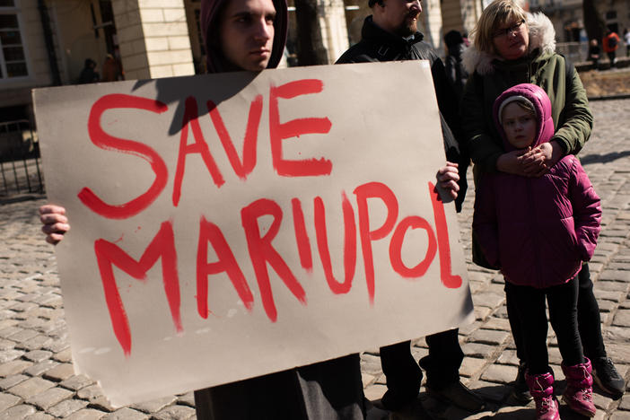 Ukrainians in Lviv show support for the residents and defenders of Mariupol on Saturday. Ukraine rejected Russia's calls to surrender the strategic southern port city.