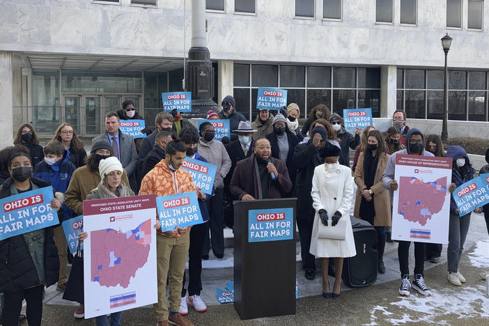 Advocates rally outside the Ohio Supreme Court on Dec. 8, 2021, in Columbus. Justices have struck down three versions of Republican-drawn state legislative maps for being unconstitutional.