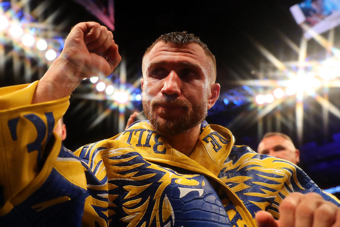 Vasiliy Lomachenko exits the arena after winning the WBA, WBO, WBC Lightweight World Title contest in 2019 in London.