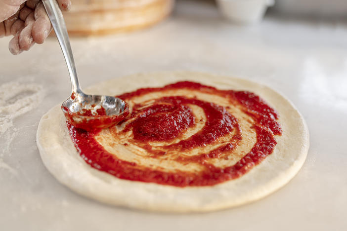 Traditionally, pizza dough is made by allowing yeast to ferment the flour and water until air bubbles form in the dough. But scientists in Naples are developing a new approach – one that doesn't rely on yeast.
