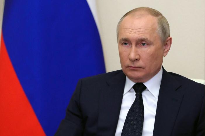 Russian President Vladimir Putin chairs a government meeting via a video link at the Novo-Ogaryovo state residence outside Moscow on Wednesday. Putin said Russia will only accept payments in rubles for gas deliveries to "unfriendly countries," which include all EU members and the U.S.