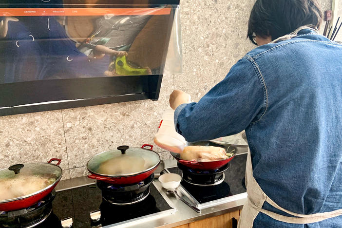 Chef Peter — he doesn't want his full name used because he wants to keep his restaurant out of the limelight — prepares duck, which will be finished off with his special Lu sauce (with soy sauce, ginger, garlic and a special ingredient donated by his late mother).