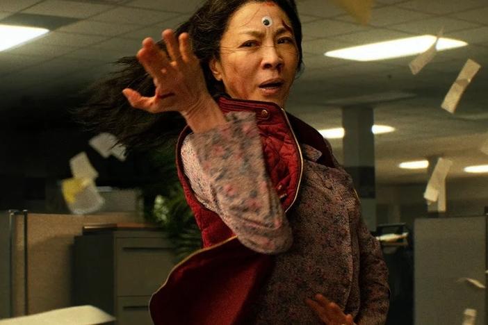 Michelle Yeoh stars as a woman who suddenly develops the power to leap between parallel universes in the action-adventure-fantasy <em>Everything Everywhere All at Once.</em>