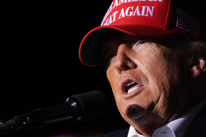Former President Donald Trump speaks to the crowd on March 12, 2022 in Florence, S.C. On Thursday he filed lawsuit against Hillary Clinton, the DNC and others.