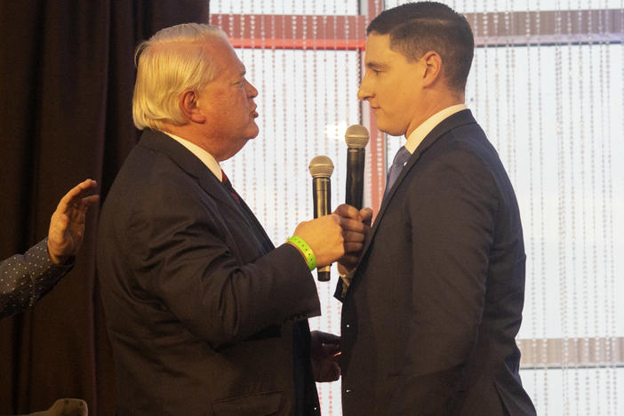 Ohio Republican U.S. Senate candidates Mike Gibbons (left) and Josh Mandel exchange heated words at a forum put on by FreedomWorks on March 18 outside of Columbus. The two have polled atop the contested GOP primary.
