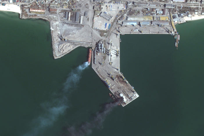 Maxar collected new satellite imagery of the southern Ukrainian port city of Berdyansk that reveals a Russian Alligator-class landing ship that is burned and partially submerged near one of the port's loading/unloading quays. Fire and smoke is also seen nearby and close to several fuel storage tanks.