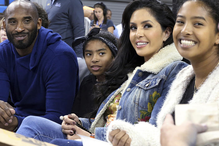 In this Nov. 21, 2017, file photo, from left, Los Angeles Lakers legend Kobe Bryant, his daughter Gianna Maria-Onore Bryant, wife Vanessa and daughter Natalia Diamante Bryant are seen before an NCAA college women's basketball game between Connecticut and UCLA, in Los Angeles.