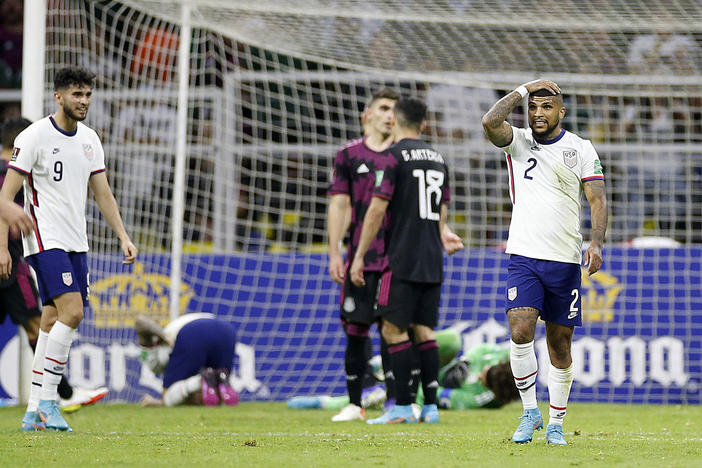 United States defender DeAndre Yedlin (2) reacts after United States forward Christian Pulisic (10) and Mexico goalkeeper Guillermo Ochoa (13) collide in the first half at Estadio Azteca on Thursday.