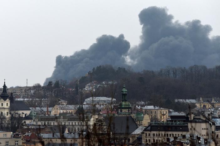 Dark smoke rises from a fire following an airstrike in the western Ukrainian city of Lviv on Saturday.