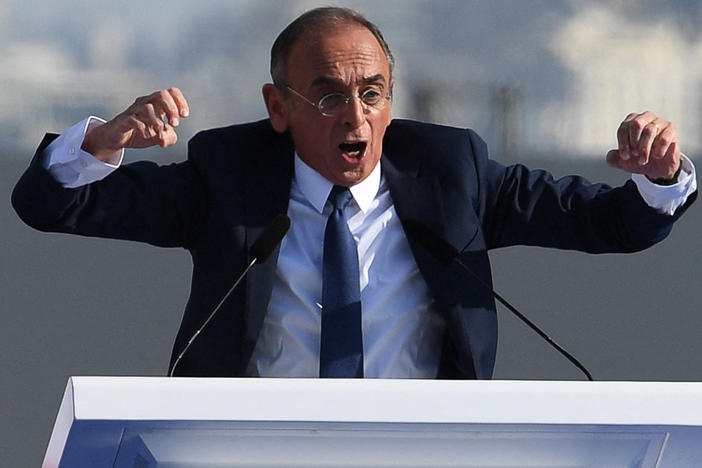 French far-right presidential candidate Eric Zemmour delivers a speech during a campaign rally on the Trocadero square in Paris on Sunday. A lawsuit accuses Zemmour of trying to falsify history about France's role in the Holocaust.