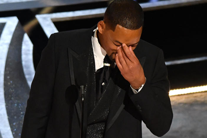 Will Smith accepts the award for best actor in a leading role for <em>King Richard</em>, not long after slapping Chris Rock onstage at the Oscars.