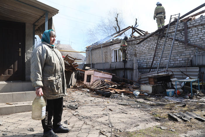 A view of some of the damage after shelling in pro-Russian, separatist-controlled Donetsk, in eastern Ukraine's Donbas region, on Monday. Several houses and garages were damaged, and some homes were completely burned down.