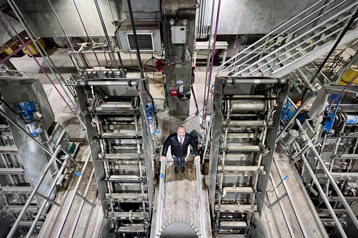 Pieter Van Ry, director of the South Platte Renew wastewater treatment facility in Englewood, Colo., stands surrounded by solid-waste separators.