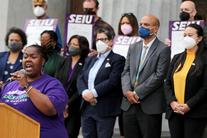 Pecolia Manigo of Reparations for Black Students speaks in a press conference at Oakland City Hall in Oakland, Calif., on Feb. 9, 2022.