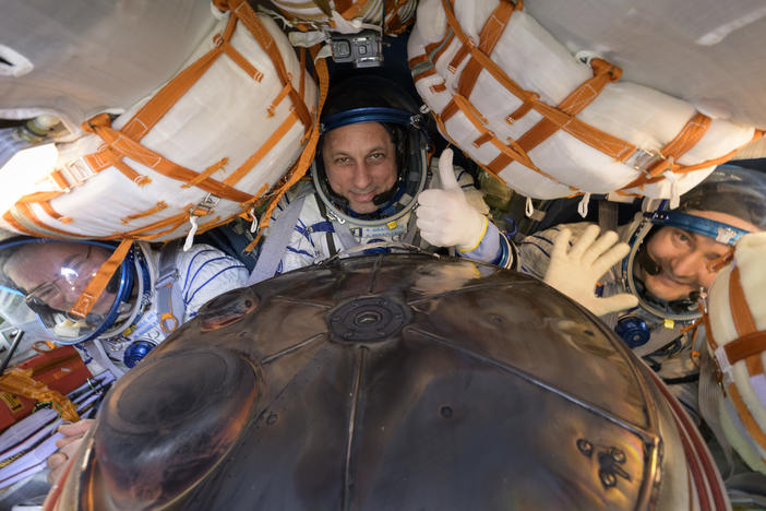 Expedition 66 crew members (left to right) Mark Vande Hei of NASA and cosmonauts Anton Shkaplerov and Pyotr Dubrov of Roscosmos are seen inside their Soyuz MS-19 spacecraft after it landed in a remote area near the town of Zhezkazgan on Wednesday in Zhezkazgan, Kazakhstan.