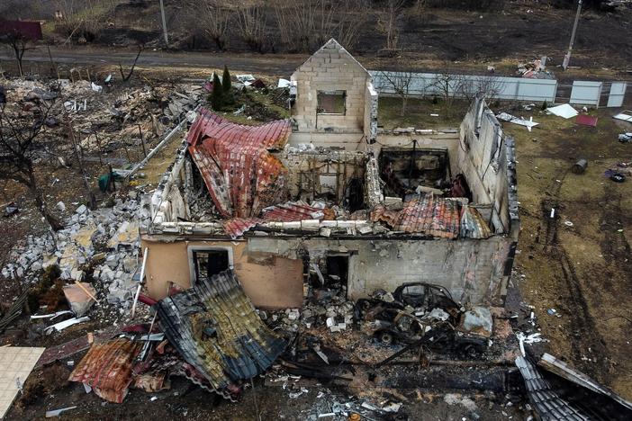 This aerial view taken near Kyiv on Wednesday shows a destroyed house in the village of Lukianivka.