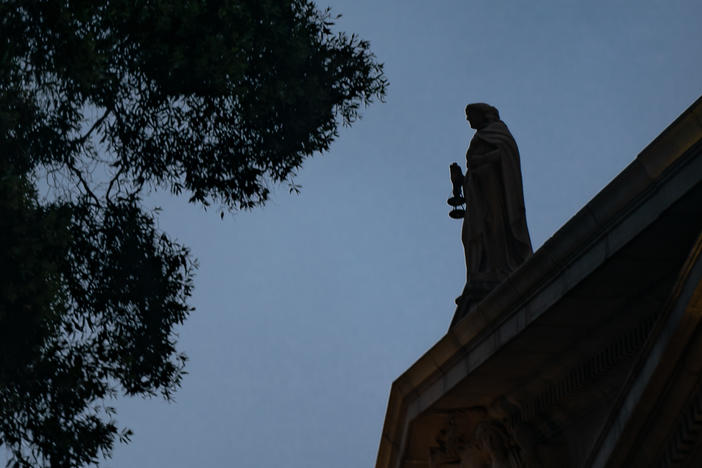 The Lady Justice statue stands atop the Final Court of Appeal in Hong Kong after a ceremony to mark the opening of the legal year on Jan. 24, 2022 in Hong Kong.