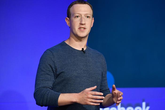 Meta CEO Mark Zuckerberg speaks during a press conference in 2018. Zuckerberg and his wife, Priscilla Chan, donated hundreds of millions of dollars to local election officials leading up to the 2020 election.