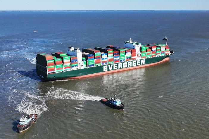 Tugboats pull on the Ever Forward near Pasadena, Md., on Tuesday, trying to free the ship as it sits in the Chesapeake Bay after running aground near Baltimore.