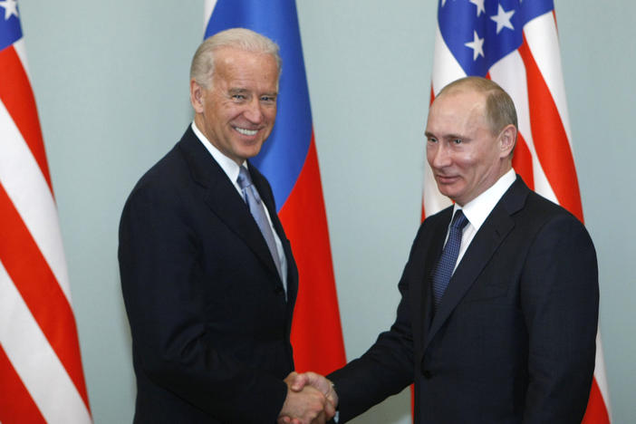 In this March 10, 2011 file photo, then-Vice President Joe Biden, left, shakes hands with Russian Prime Minister Vladimir Putin in Moscow, Russia.