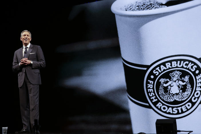 Starbucks Executive Chairman Howard Schultz, seen at a shareholder meeting in 2018, returned to Starbucks as interim CEO on Monday.