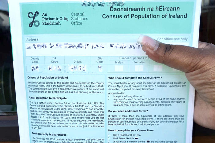 A person fills out an Irish census form on Sunday. A new time capsule feature allows people to add personal messages that stay under wraps for 100 years.