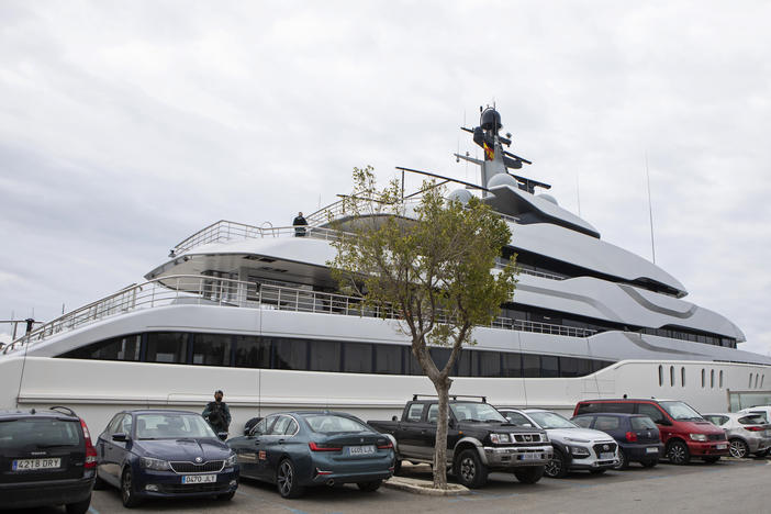 A Civil Guard stands by the yacht called Tango in Palma de Mallorca, Spain, on Monday. U.S. federal agents and Spain's Civil Guard are searching the yacht owned by a Russian oligarch.