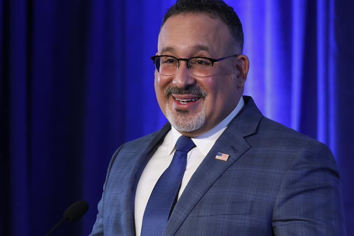 U.S. Education Secretary Miguel Cardona delivers remarks in Washington, D.C., in January. The department has extended the freeze on federal student loan payments several times since the pandemic began in March 2020.