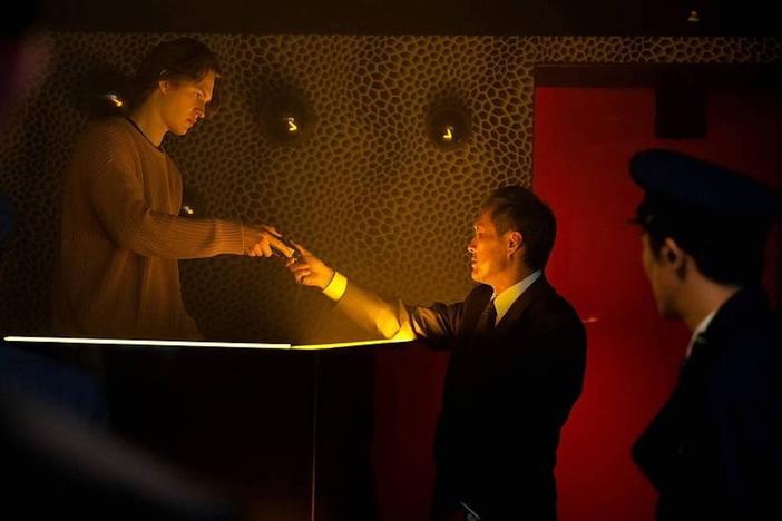 An American crime reporter (Ansel Elgort) allies himself with a frustrated police detective (Ken Watanabe) in the HBO Max series <em>Tokyo Vice.</em>
