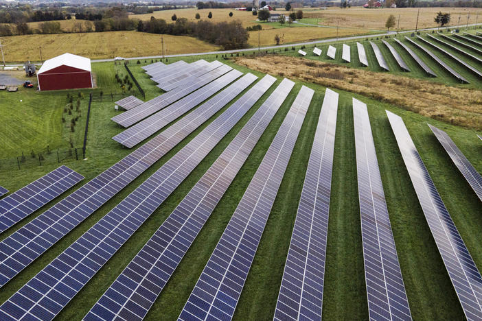 Farmland is seen with standard solar panels from Cypress Creek Renewables, Oct. 28, 2021, in Thurmont, Md.