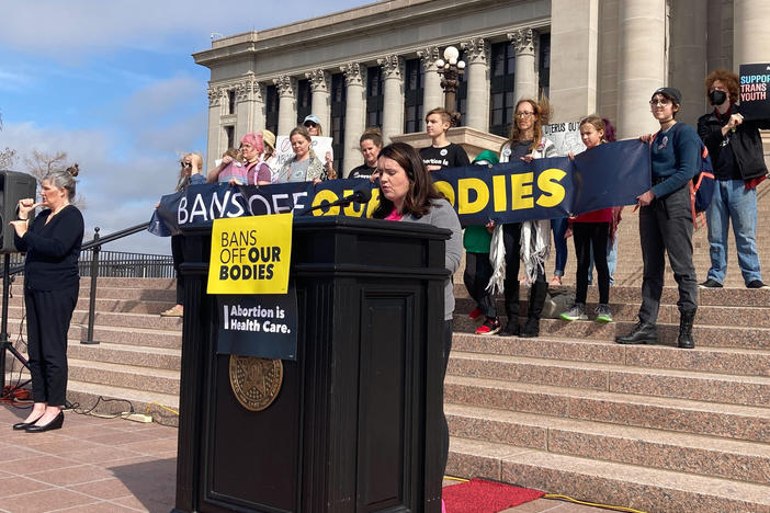 Emily Wales, interim CEO of Planned Parenthood Great Plains Votes, speaks to a group of abortion rights advocates outside the state Capitol in Oklahoma City on Tuesday. The Oklahoma House gave final legislative approval to a bill that would make performing an abortion a felony.