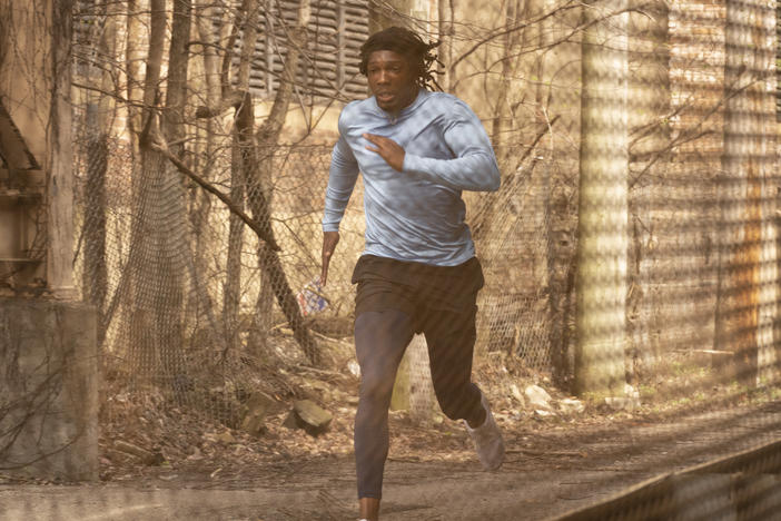 Track star Moses Johnson (Tosin Cole) ends up in the wrong place at the wrong time in the AMC series <em>61st Street.</em>