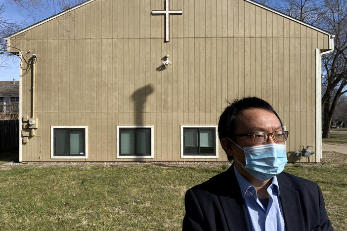 Feng "Franklin" Tao stands in front of a church in Lawrence, Kan., on March 20.