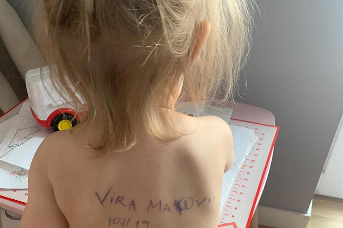 Aleksandra Makoviy said she isn't the only Ukrainian mother to write emergency contact info on their children since the war began.