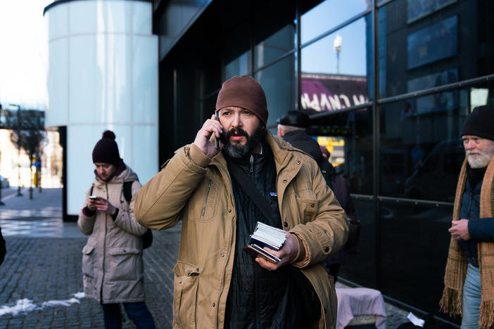 U.S. Army and Navy combat veteran Bryan Stern sorts out logistics on the phone for evacuations in Kyiv, Ukraine, last month. Stern runs a nonprofit organization called Project Dynamo that extracts people from hostile places.