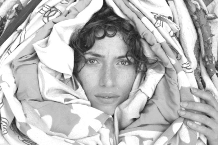 New Zealand songwriter Aldous Harding is a chameleonic presence on the new album <em>Warm Chris</em>, pulling off one mask only to reveal another.