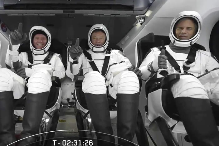 The SpaceX crew is seated in the Dragon spacecraft on Friday, in Cape Canaveral, Fla., before their launch to the International Space Station.