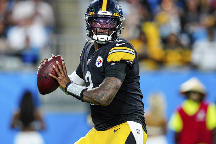 Pittsburgh Steelers quarterback Dwayne Haskins plays against the Carolina Panthers during a 2021 preseason NFL football game Charlotte, N.C.