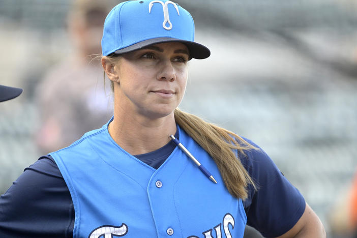 Tampa Tarpons manager Rachel Balkovec watches from the top steps of the dugout, while making her debut as a minor league manager of the Tampa Tarpons on Friday in Lakeland, Fla.