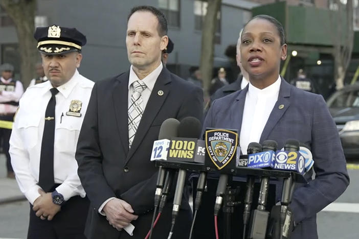 In this image taken from video provided by the NYPD, New York Police Commissioner Keechant Sewel, right, speaks during a news conference, Friday, April 8, 2022, in New York.