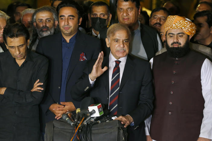 Pakistan's opposition leader Shahbaz Sharif, center, speaks while other opposition parties leader watch during a press conference after the Supreme Court decision, in Islamabad, Pakistan, on April 7, 2022.